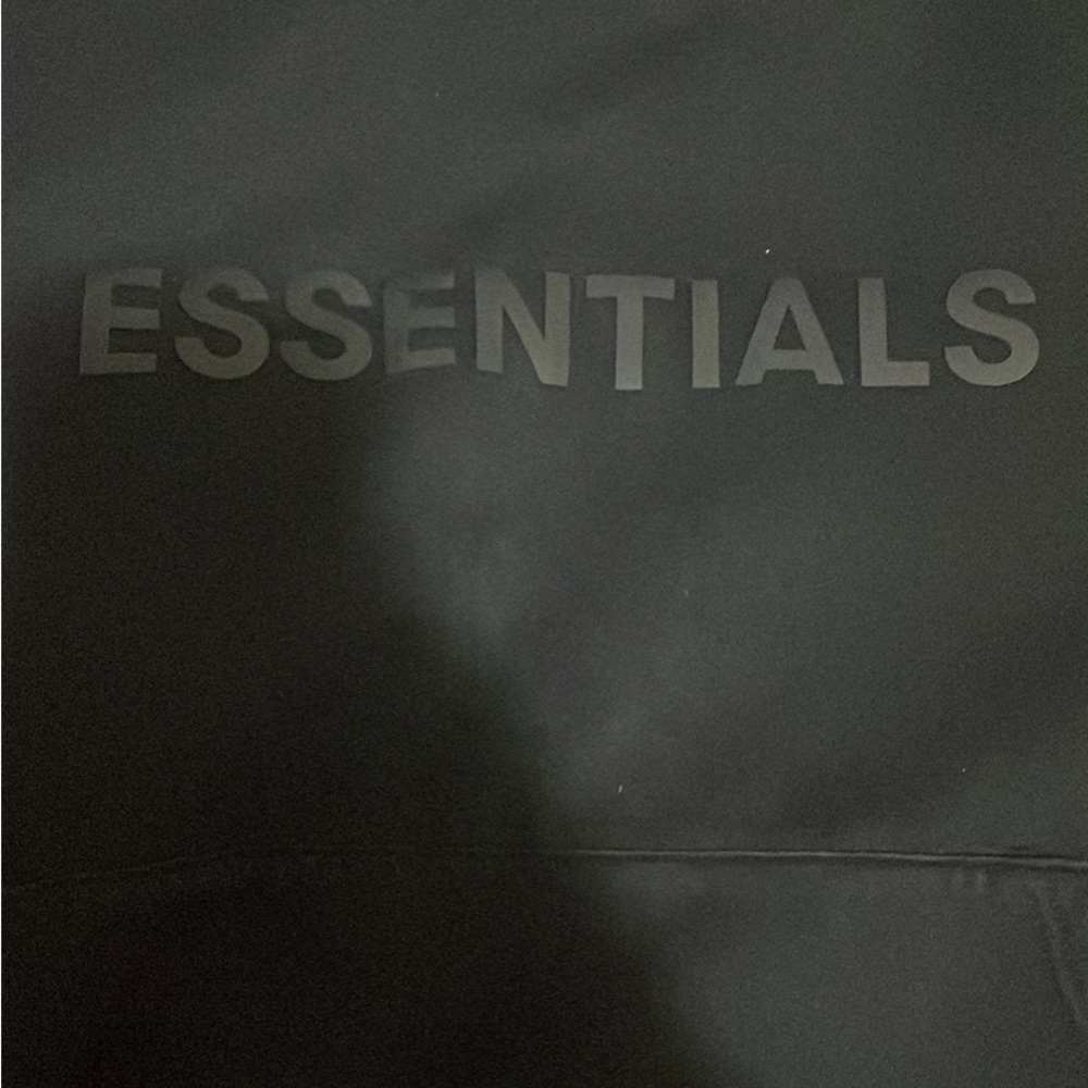 Black essentials hoodie.